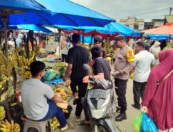 Personel Polsek Muara Satu Sambangi Pedagang Pasar Tradisional dalam Patroli Dialogis