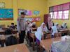 Polsek Muara Dua Kawal Penyaluran 2.659 Paket Makan Bergizi Gratis ke 14 Sekolah di Lhokseumawe