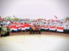 Pemko Lhokseumawe Bagikan Bendera Merah Putih dan Luncurkan Bahasa Aceh di Pelayanan Publik