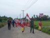 Kapolsek Meurah Mulia Turun Langsung Kawal Gerak Jalan HUT RI ke-80