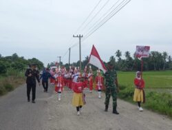 Kapolsek Meurah Mulia Turun Langsung Kawal Gerak Jalan HUT RI ke-80