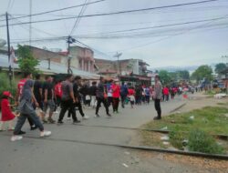 Polsek Muara Satu Amankan Jalan Santai HUT ke-80 RI di Desa Batuphat Timur