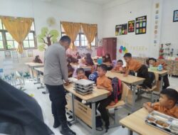 Polisi Hadir Kawal Program MBG, Pastikan Pembagian Makanan Bergizi di Muara Dua Aman dan Lancar
