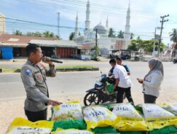 Polres Lhokseumawe Gelar Gerakan Pangan Murah di Dewantara, Sediakan 1 Ton Beras untuk Warga