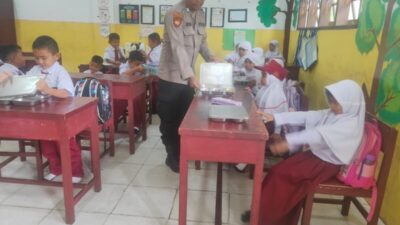 Polsek Muara Dua Monitoring Program Makan Bergizi Gratis untuk Ribuan Siswa dan Kelompok B3