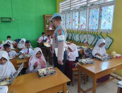 Polri Hadiri dan Kawal Pembagian 3.159 Paket Makan Bergizi Gratis di Dewantara