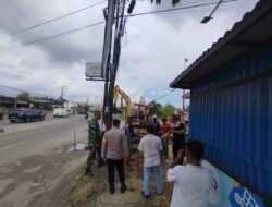 Polisi Amankan Jalur Tergenang, BPJN PPK 1.3 Aceh Normalisasi Saluran Air di Desa Uteunkot