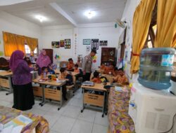 Polsek Muara Dua Kawal Distribusi Program Makan Bergizi Gratis untuk Siswa dan Kelompok Rentan