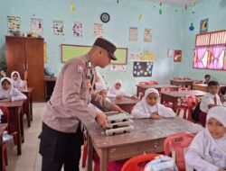 Polsek Muara Dua Monitoring Pembagian 7.480 Paket Makan Bergizi Gratis di Sekolah dan Posyandu