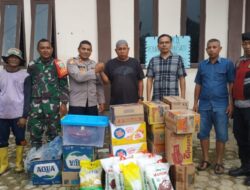 Polres Lhokseumawe Salurkan Bantuan untuk Warga Cot Euntung Korban Banjir, Kapolsek Nisam Dampingi Penyerahan