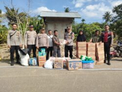 Kapolres Lhokseumawe Salurkan Bantuan Sembako ke Dua Desa Terdampak Banjir di Banda Baro