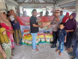 Polsek Samudera Distribusikan Bansos Alumni Akpol 91 kepada Warga Korban Banjir di Desa Matang Puntong