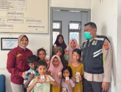 Polres Lhokseumawe Gelar Trauma Healing dan Pengobatan Gratis untuk Korban Banjir di Pante Gurah