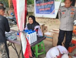 Polres Lhokseumawe Gelar Servis dan Cuci Motor Gratis bagi Warga Terdampak Banjir di Syamtalira Bayu