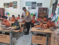 Personel Polsek Muara Dua Monitoring Program Makan Bergizi Gratis BGN untuk Pelajar dan Kelompok B3