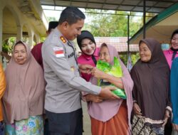 Kapolres Lhokseumawe dan Ketua Bhayangkari Salurkan Bantuan bagi Warga Terdampak Banjir di Desa Ujung Pacu