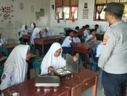 Polsek Muara Satu Kawal Penyaluran MBG 7.090 Porsi Disalurkan ke Pelajar dan Masyarakat