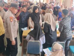 Polisi Kawal Penyaluran Bantuan Pangan Pemerintah di Muara Batu, 1.206 KK Terima Beras dan Minyak Goreng