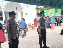 Polsek Dewantara Kawal Penyaluran Bantuan Pangan Bulog di Gampong Paloh Lada