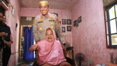 Kapolres Lhokseumawe Salurkan Kursi Roda dan Santunan kepada Lansia di Ujong Pacu