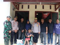 Wujud Kepedulian, Kapolres Lhokseumawe Berikan Kursi Roda dan Santunan untuk Dua Anak Penyandang Disabilitas