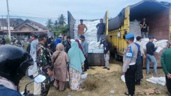 Polres Lhokseumawe Kawal Penyaluran Beras Bantuan Pangan untuk 2.492 Keluarga di Muara Dua