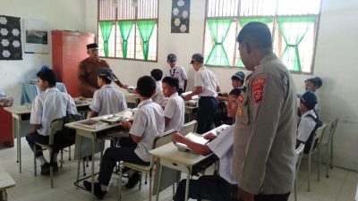 Polisi Kawal Penyaluran MBG untuk Ribuan Penerima Manfaat di Muara Satu
