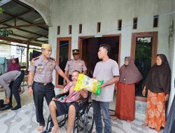 Kapolres Lhokseumawe Bantu Kursi Roda dan Sembako untuk Warga Lumpuh di Kuta Makmur